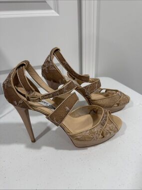 Never worn Jimmy Choo Tan Lace Platform High-Heel Sandals. 2 tiny marks on right